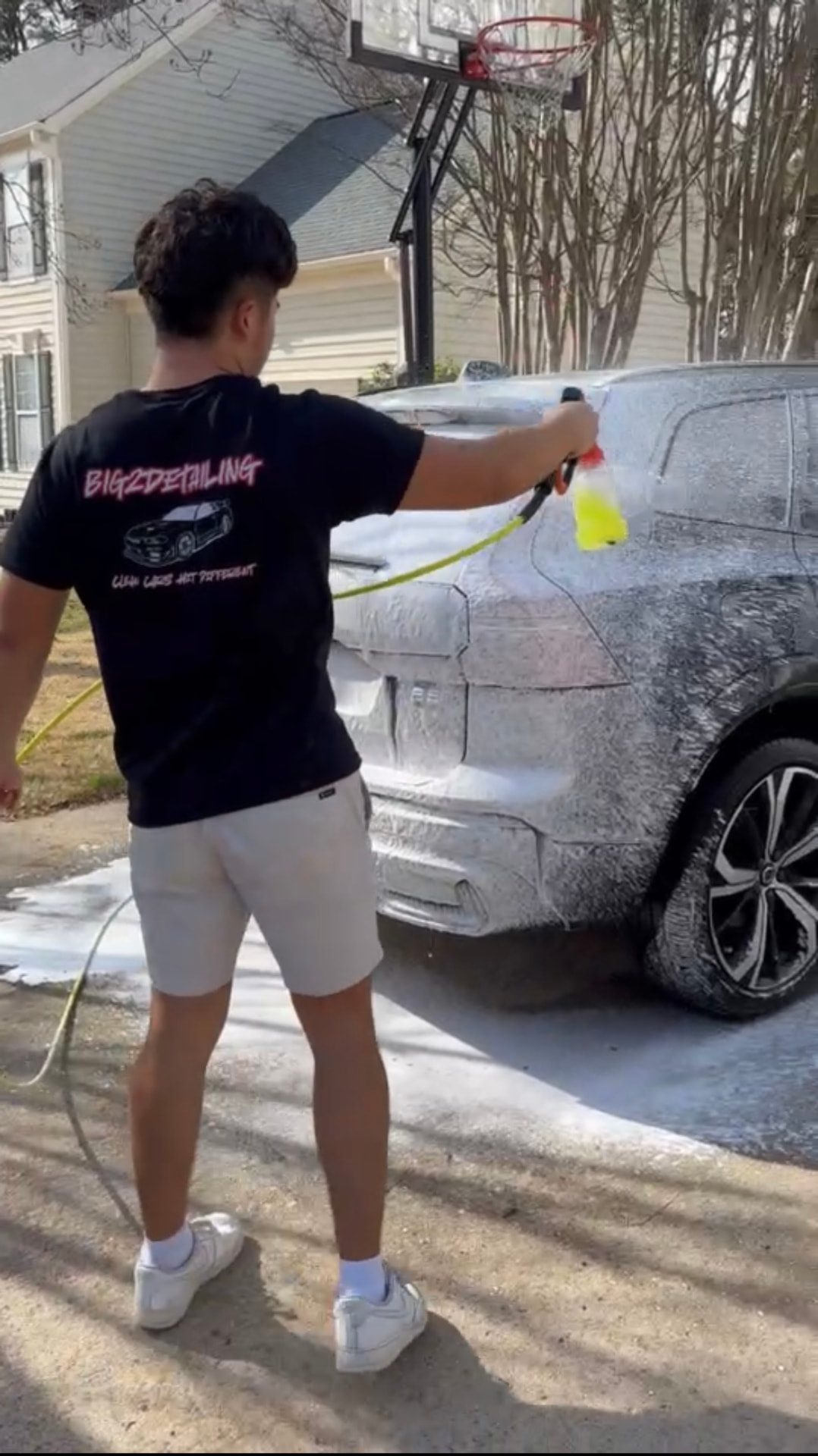 Big2Detailing technician foaming a detailed car